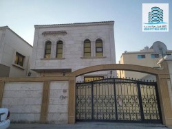 Villa for rent in Ajman, Al Rawda 3 area The second row of Sheikh Ammar Street It consists of two floors Stone facade 5 master rooms council Lounge Ex