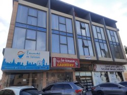 A new building for sale in Al Mowaihat area, the building is 5 years old, and a very special location