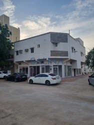 Building in Al Bustan, excellent location, corner of two streets