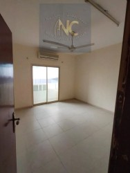 For annual rent in Ajman, two rooms and a hall overlooking the creek on Al Mina Street