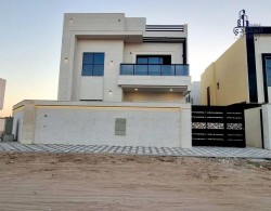 For sale, a corner villa in Al Helio area, Ajman, modern modern finishing, at an excellent price, 100% bank financing, close to all services, freehold