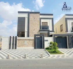 For sale, modern villa, prime location, opposite Al Hamidiya Park, modern design, super deluxe finishing, close to all services, freehold for all nati