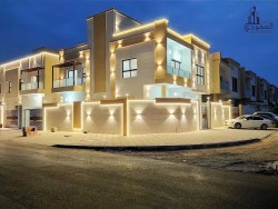 For sale, without down payment, personally finished villa, large area, directly on Sheikh Mohammed bin Zayed Road, palace design, three floors, corner
