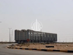 I own commercial land for sale in Sharjah on a main street, with a down payment of 10% and easy installments Without any benefits